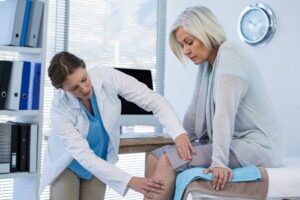 68356aac2528c662d2a02462_doctor-examining-patient-knee (1).jpg &nbsp;